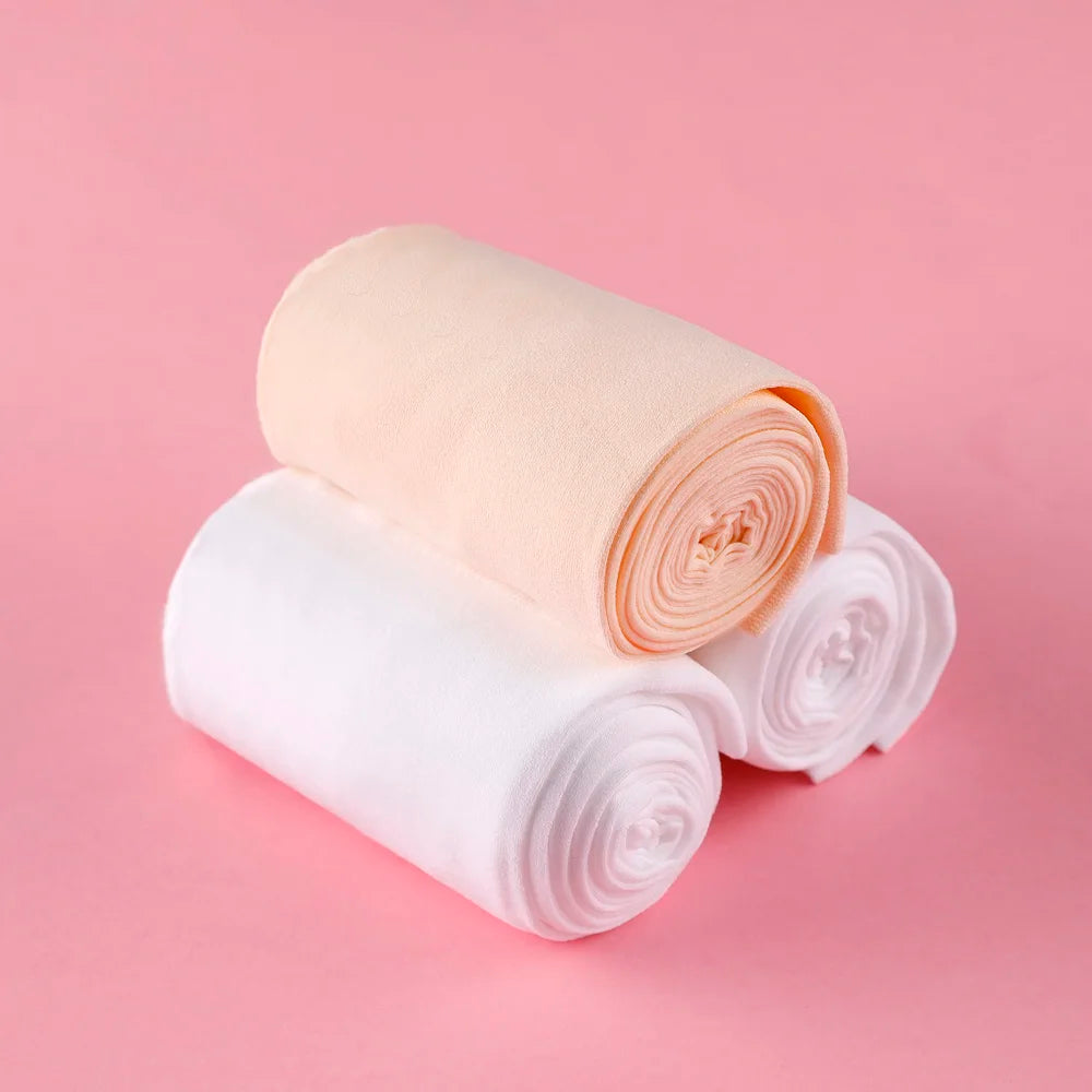 Collants danse avec pieds pour enfants coloris beige ou blanc