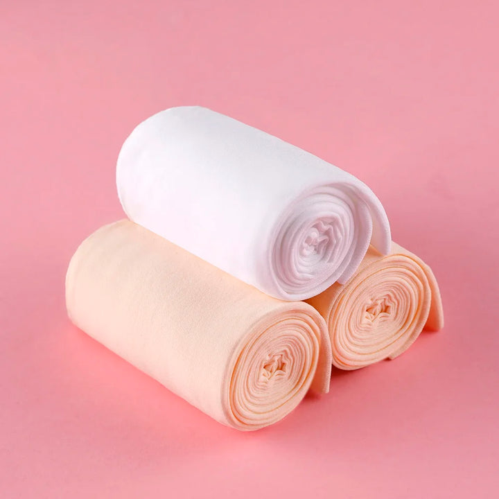 Collants danse avec pieds pour enfants coloris beige ou blanc