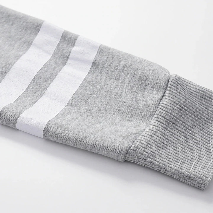 Sweat-shirt à capuche manches rayures