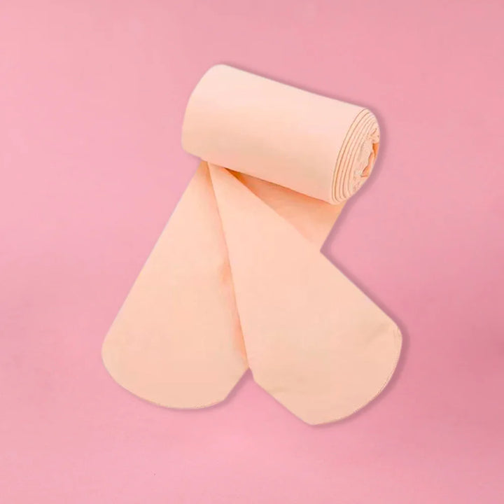 Collants danse avec pieds pour enfants coloris beige ou blanc